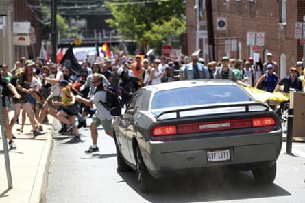 A vehicle drives into a group of people on 12 August 2017 protesting the Unite the Right rally in Charlottesville, Virginia.