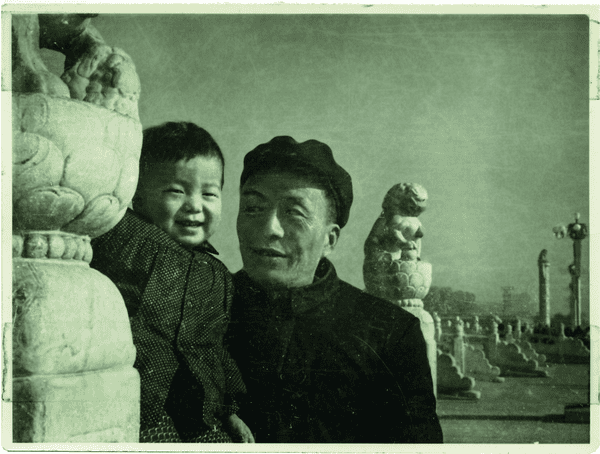 Ai Weiwei with his father, Ai Qing, at Tiananmen Square, Beijing, 1959.