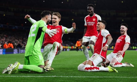 Arsenal celebrate after beating Porto in their last-16 penalty shootout