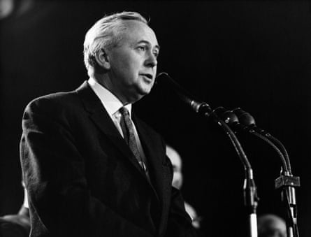 Harold Wilson, pictured in black and white, gives a speech