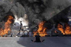 Jalazone, West Bank: Tyres set alight by protesters burn at the site where two Palestinians were killed by the Israeli army in the Jalazone refugee camp near the city of Ramallah