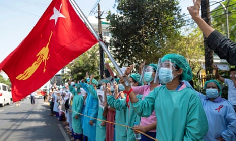 Medical workers rally against the military coup and to demand the release of elected leader Aung San Suu Kyi, in Yangon, Myanmar, on 10 February.