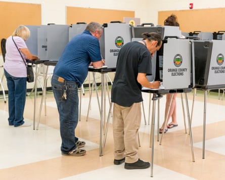 Voters at voting booths