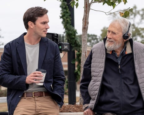 This image released by Warner Bros. Entertainment shows Nicholas Hoult, left, and director Clint Eastwood behind the scenes during production for "Juror #2". (Warner Bros. Entertainment via AP)
