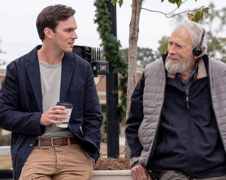 Nicholas Hoult, left, and director Clint Eastwood behind the scenes of Juror #2.
