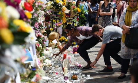 Floral tributes near Grenfell Tower in June 2017