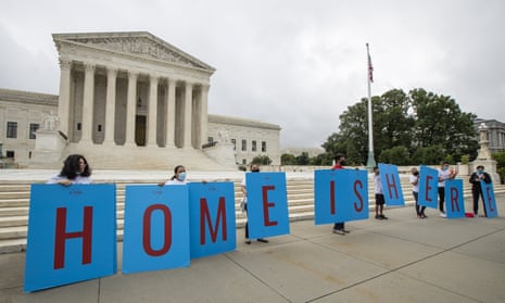 Daca students gather in front of the supreme court in Washington on 18 June 2020. 