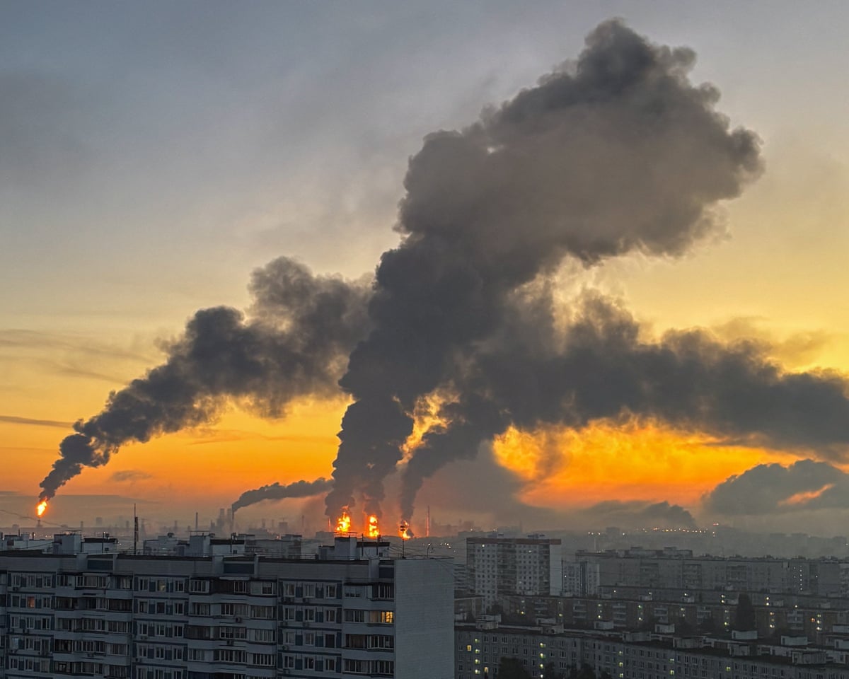 Smoke rises from an oil refinery following a Ukrainian drone strike in Moscow, Russia