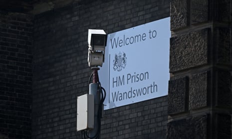 Woman charged over video showing prison officer having sex with  