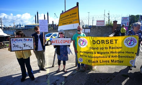 Pro-migrant campaigners at Portland Port.