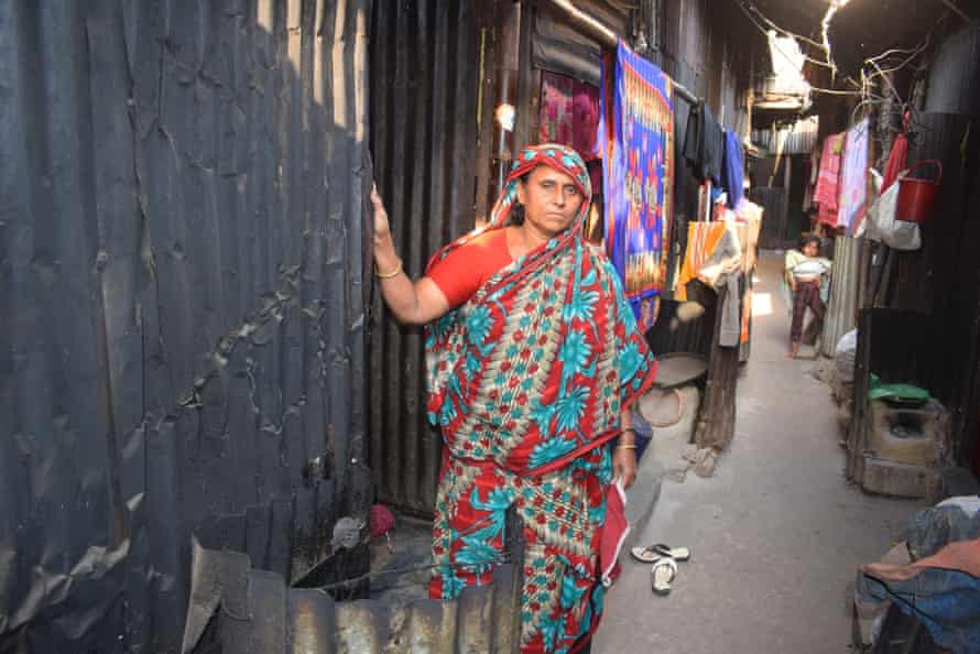 Shahida Begum outside her shack in the Kalyanpur slum. It is an unhealthy environment but it's home.