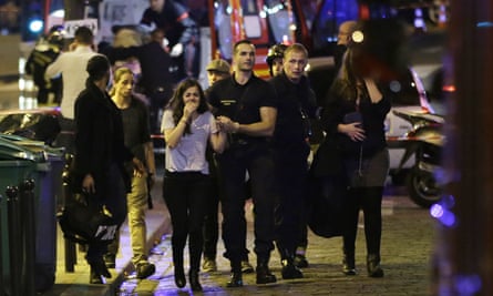 People being led to safety during the Paris attacks.