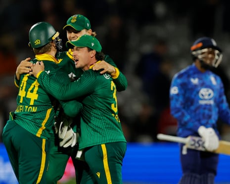 South Africa players celebrate their victory.