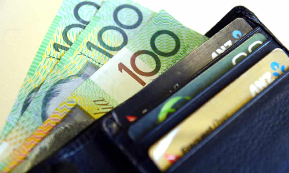 $100 Australian dollar notes pop out of a wallet