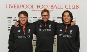 Jürgen Klopp, centre, and his assistants Peter Krawietz, left, and Zeljko Buvac. All three have signed contract extensions at Liverpool