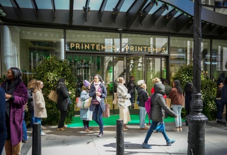 People mill about a store