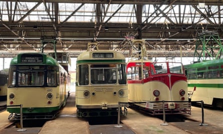 Three vintage trams on display at the Tram Town museum at the Talbot Road depot in Blackpool, UK.