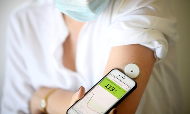 A woman with diabetes monitors her glucose levels.
