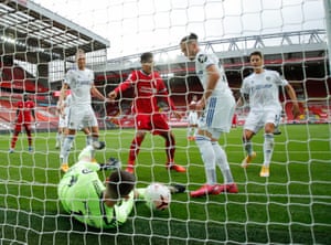 The Leeds goalkeeper, llan Meslier, cannot stop Virgil van Dijk scoring Liverpool’s second goal after the captain was left totally unmarked
