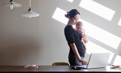 Woman with child working at home