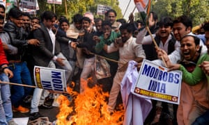 Protesters burning an effigy of billionaire jeweller Nirav Modi in New Delhi in February.