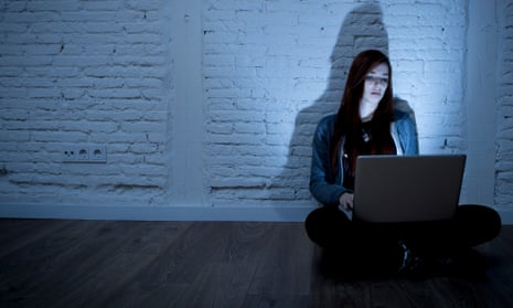 Teenager using laptop