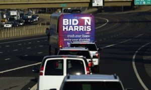 A bus carrying Joe Biden and Kamala Harris heads to a campaign stop in Phoenix, Arizona in October.