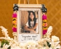 A portrait of 12-year-old school shooting victim Naphat Chaima is displayed in front of her coffin during her funeral at the Wat Lat Pla Duk Buddhist temple in Nonthaburi province, Thailand.