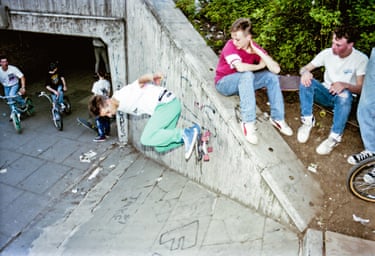 A group of people, some on BMX bikes and some on skateboards