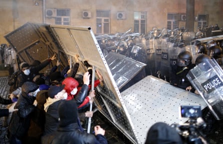 Protesters clash with police outside parliament during a protest against bill on foreign influence transparency in Tbilisi, Georgia.