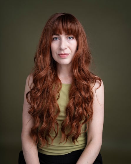 Leah wearing the red wavvy Wokestar wig