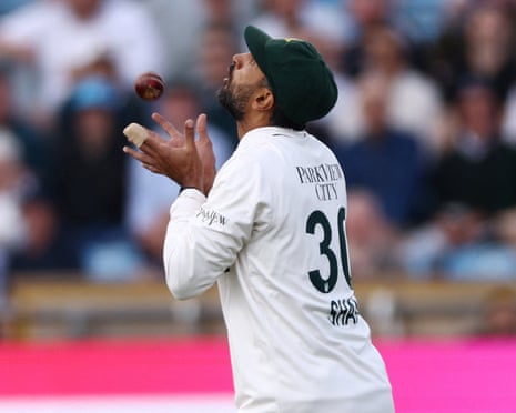 Pakistan's Shan Masood takes a catch to dismiss England's Jamie Smith off the bowling of Pakistan's Khurram Shahzad.