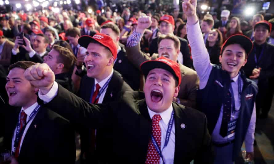 Supporters of Donald Trump cheer during his election night event at the New York Hilton Midtown on 8 November 2016