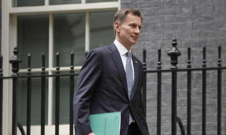 A photo of Chancellor Jeremy Hunt leaving 11 Downing Street in November.