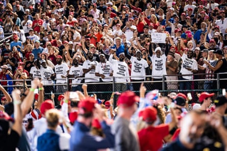 a crowd of people cheering