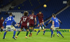 Romain Saïss heads the ball into the corner.