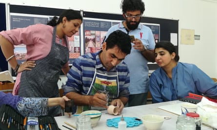 Ghulam Hyder Daudpota teaching at a ceramics workshop.