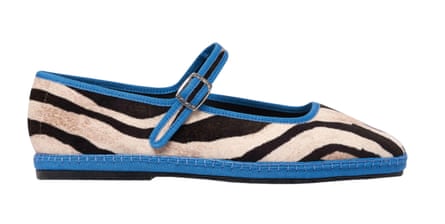 Zebra print flats with blue trim and cross strap