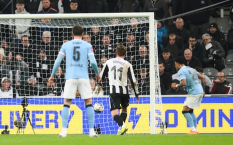 Savinho of Manchester City scores their first goal.