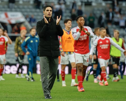 Mikel Arteta applauds the away supporters after the Premier League match between Newcastle and Arsenal
