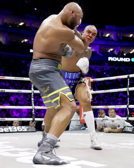 A bloodied Fabio Wardley lands a right on Frazer Clarke at the O2 in March 2024.