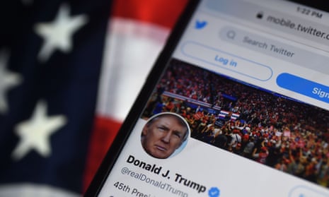 A mobile user views Donald Trump’s Twitter feed. The platform has now announced his account is permanently suspended.
