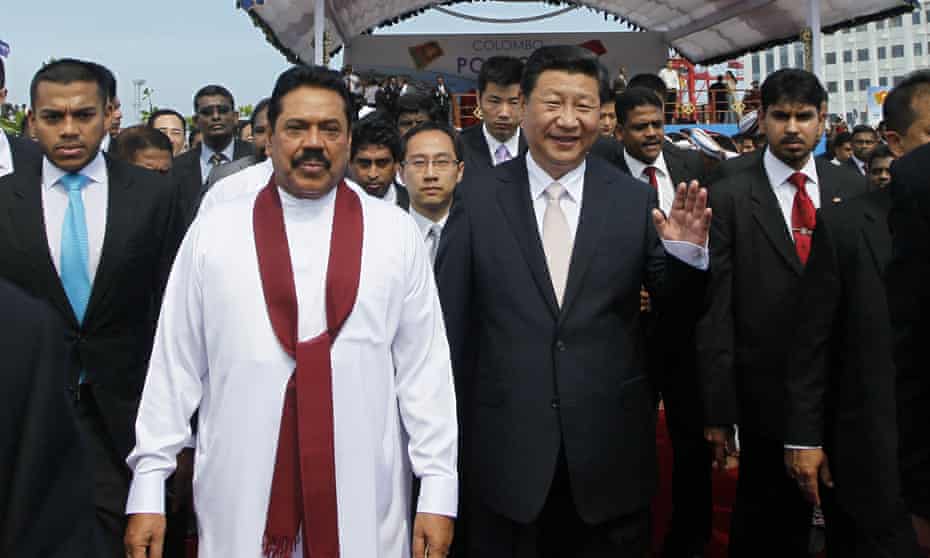 Mahinda Rajapaksa, who was Sri Lanka’s prime minister, with the Chinese president Xi Jinping after launching a project to construct a $1.4 billion port city on an artificial island off Colombo.