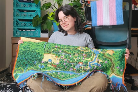 Crochet artist Jack Evil with Stardew Valley map