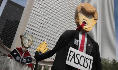 Puppets of Donald Trump and Jeff Sessions at a protest in Chicago at the weekend. 