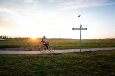 A person rides a bike outside the reception centre