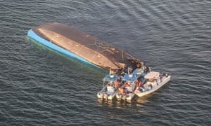 Tanzania Ferry Disaster Divers Pull Survivor From Capsized