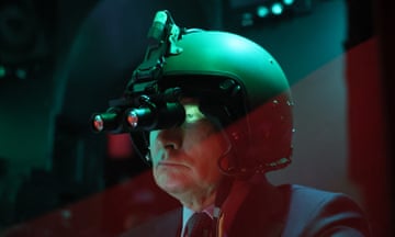 Vladimir Putin wearing a helmet with night-vision goggles