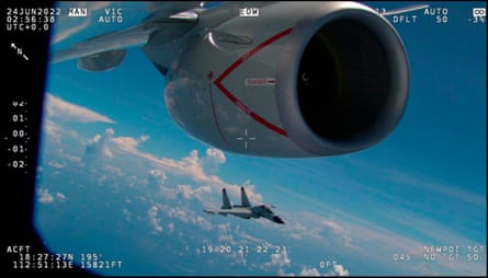 This image from video provided by the US defence department, shows an intercept of a US warplane by Chinese aircraft.