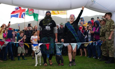 Chris Lewis with partner Kate Barron and their son, Magnus, and adopted dog, Jet,